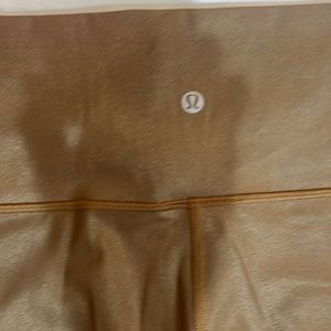 Size 6 lululemon gold pants. These pants are in perfect shape!